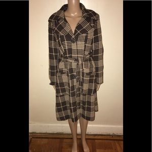 Last Kiss brand pleaded brown and beige coat.